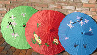 Pastel coloured parasols ... Hire
